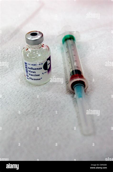 Flu Vaccine Vial And Syringe Stock Photo Alamy