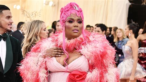 Lizzo Really Wore Her Feathery Met Gala Look Straight To The Airport