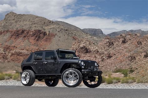 Off- Road Warrior Bespoke Black Jeep Wrangler on Chrome Wheels — CARiD ...