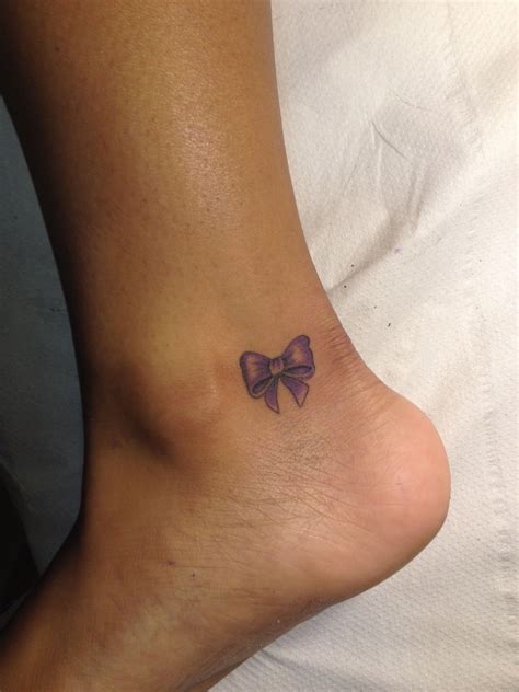 Pin By Bri Boneta On Tattoos An Piercings Bow Tattoo Tattoos For