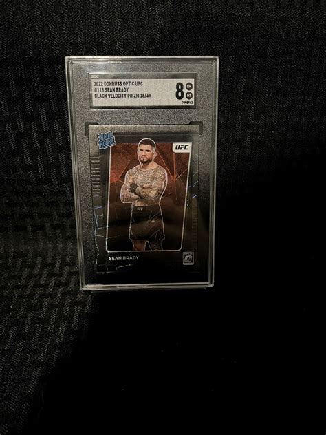 2022 Donruss Optic UFC Sean Brady Black Velocity Prizm 39 SGC 8 EBay