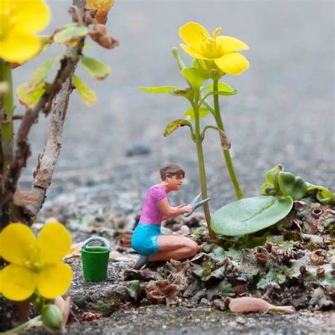 Miniature Street Art Installations by Slinkachu Interact with Their Surroundings