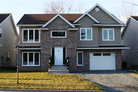 Stunning Blend Of Brick And Vinyl Siding On Dartmouth Home