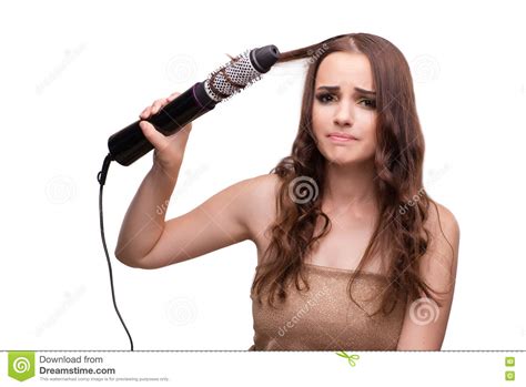 The Young Beautiful Woman With Hair Dryer Isolated On White Stock Image