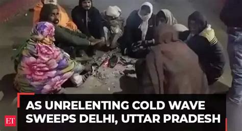 Cold Wave Mercury Dips Further In Delhi Up People Struggle For Warmth The Economic Times