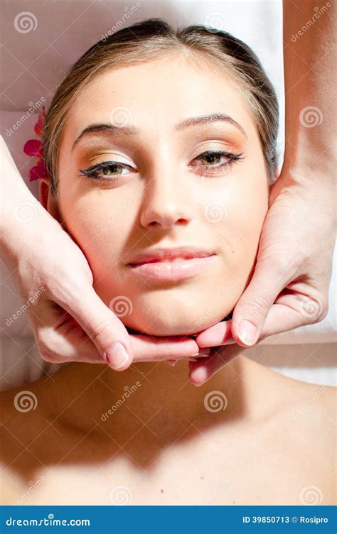 Closeup On Beautiful Nice Young Woman On Spa Treatments During Face