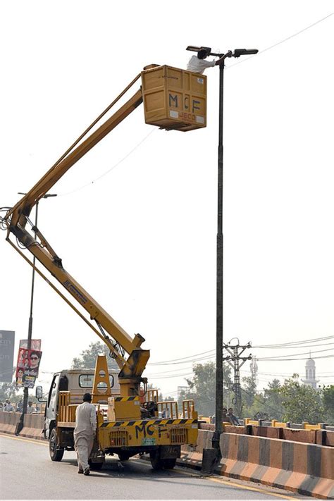 Tma Staffer Repairing Street Lights