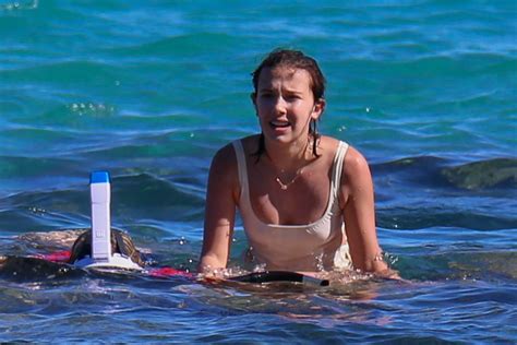 Millie Bobby Brown in White Swimsuit 2018 -20 – GotCeleb