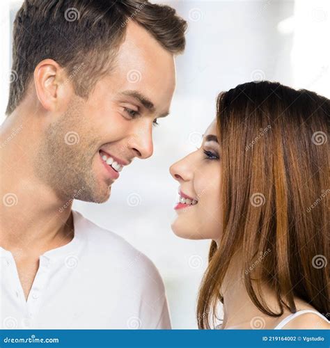 Face Portrait Of Smiling Happy Amazed Couple At Home Man And Woman