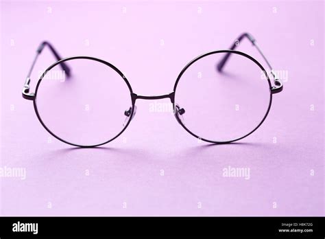 Round frame glasses with lenses Stock Photo - Alamy