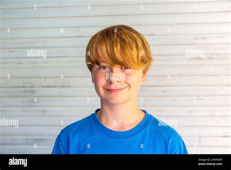 Outdoor Portrait Of Happy Smiling Boy With Harmonic Background Stock