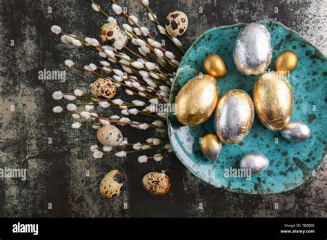 Plate With Beautiful Easter Eggs And Pussy Willow Branches On Dark Background Stock Photo Alamy
