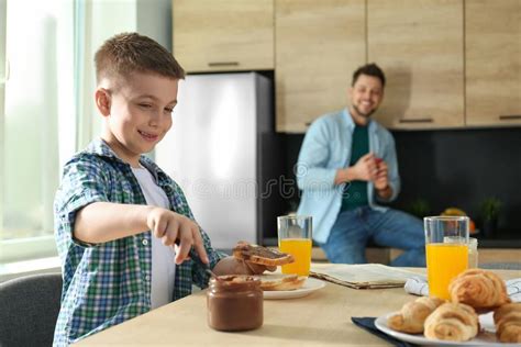 Dad And Son Having Breakfast Together Stock Photo Image Of Enjoy Mature