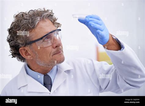 What Could This Mean A Cropped Shot Of A Mature Scientist Observing A