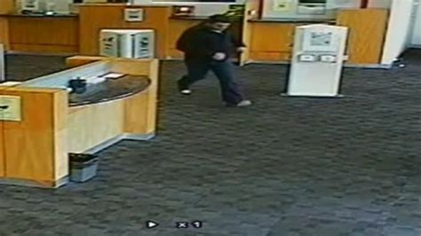 Brazen Bank Robbery Cctv Released To Help Catch Thief Who Handed Note