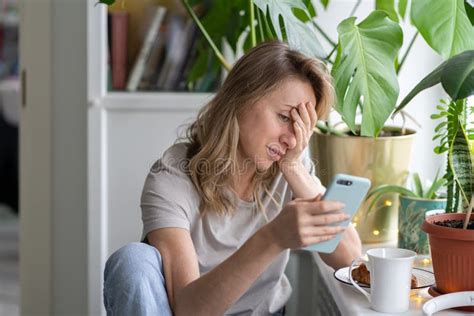 Confused Woman Doing Facepalm Gesture Touching Head With Palm Looking