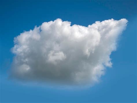 Premium Photo White Single Cloud Over Blue Sky Background Fluffy