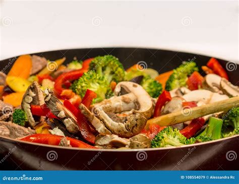 Cooking Stir-fry in Cast Iron Skillet Stock Image - Image of chinese ...