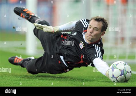 Munichs S Goalkeeper Manuel Neuer Fetcehs A Ball During Warm Up Prior