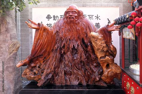 Statue on pedestal of Chinese wise man Confucius. He was a 5th century ...