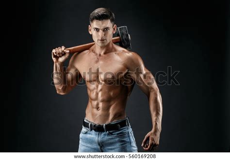Muscular Man Naked Torso Holding Big Stock Photo 560169208 Shutterstock