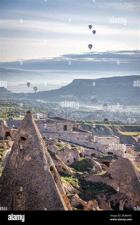 Hot Air Balloons At Sunrise Over The Fairy Chimneys At Uchisar Cappadocia Turkey Stock Photo