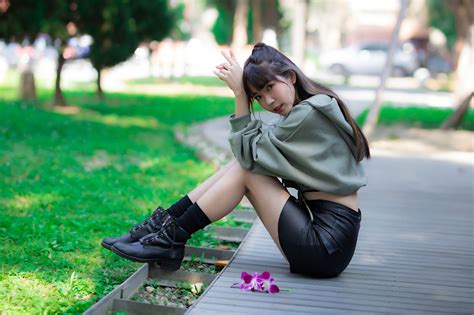 Images Skirt Blurred Background Boots Young Woman Legs Asian Sit