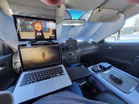 I've been turning my car into a mobile office. I'm pretty happy with it. : r/pics