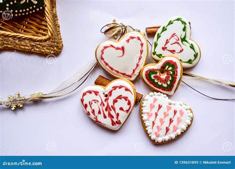 Traditionally Decorated Heart Shaped Christmas Gingerbread Cookies Background Stock Image