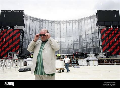 U2 manager Paul McGuinness inspects proceedings as the finishing ...