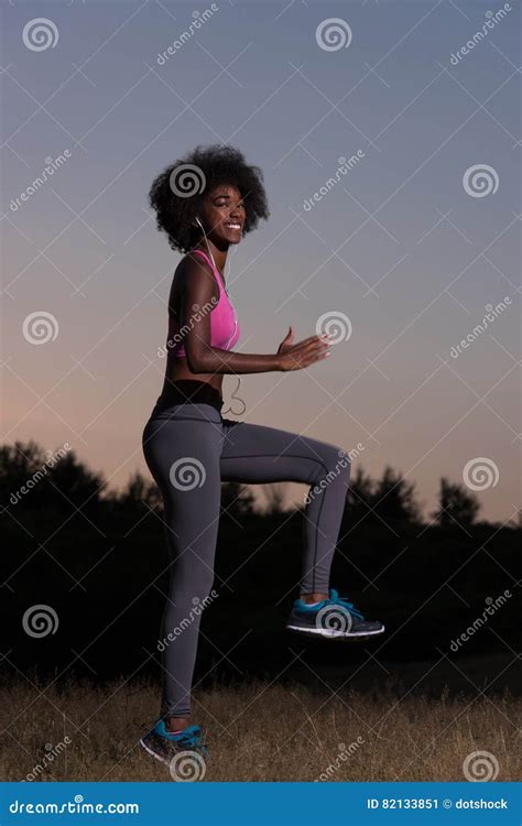 Black Woman Is Doing Stretching Exercise Relaxing And Warm Up Stock