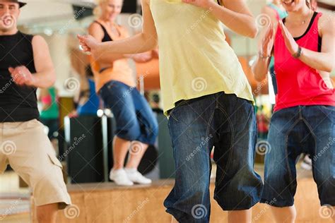 Zumba Or Jazzdance Young People Dancing In Studio Stock Photo Image