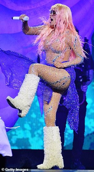 Karol G Flaunts Her Jaw Dropping Figure In A Dazzling Nude Catsuit As She Performs At The O2