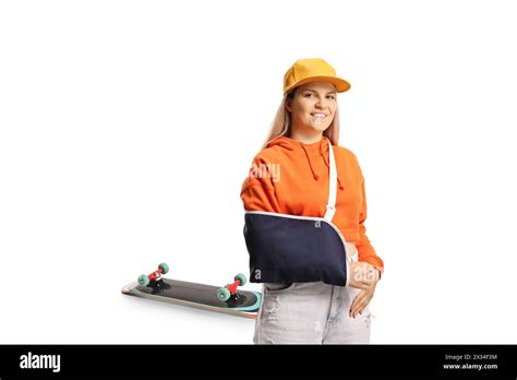 Young Female Skater With A Broken Arm Wearing An Arm Splint Isolated On
