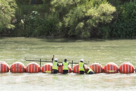 Biden administration sues Texas over anti-migrant buoys in the Rio ...