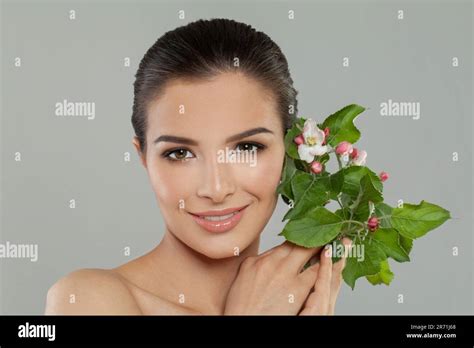 Beautiful Smiling Brunette Woman With Healthy Clear Fresh Skin Closeup