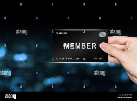 Hand Picking Member Platinum Card On Blur Background Stock Photo Alamy