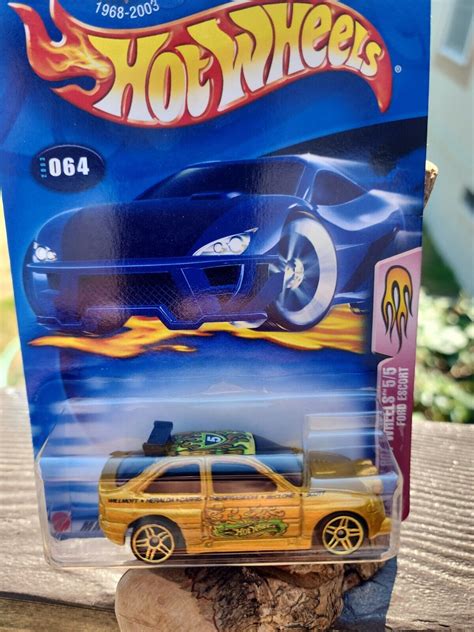 HOT WHEELS 2002 FLAMING HOT WHEELS FORD ESCORT GOLD EBay