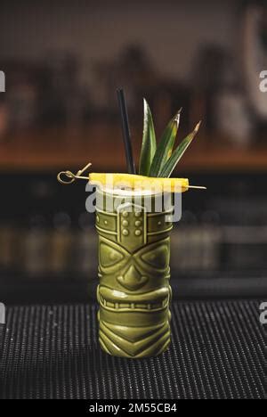 Pina Colada Cocktail In Clay Glass Decorated With Piece And Leaf Of