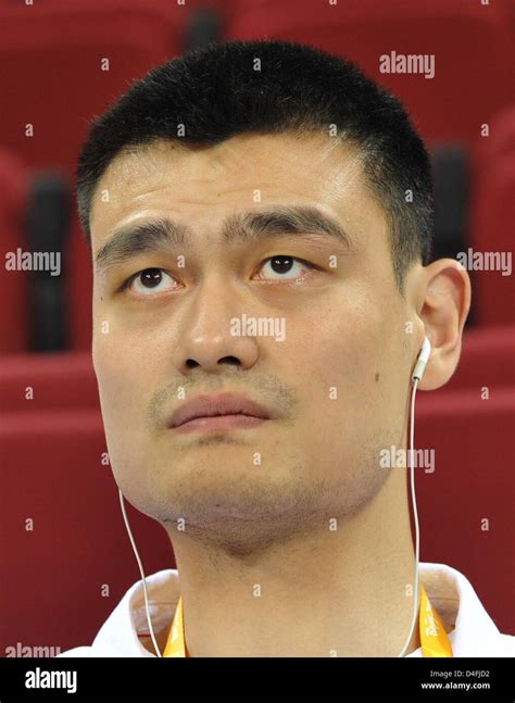 The Chinese Basketball Star Yao Ming Observe The Match Germany Against