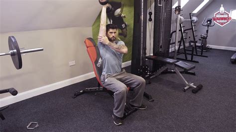 Single Arm Seated Dumbbell Tricep Extension Youtube