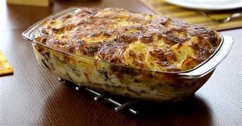 A Casserole Dish Sitting On Top Of A Wooden Table