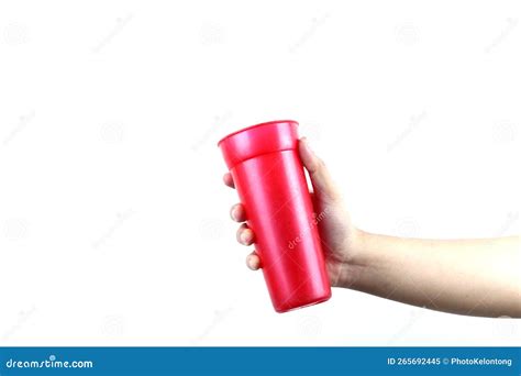 Hand Holding Red Plastic Cup Isolated On A White Background Stock Image