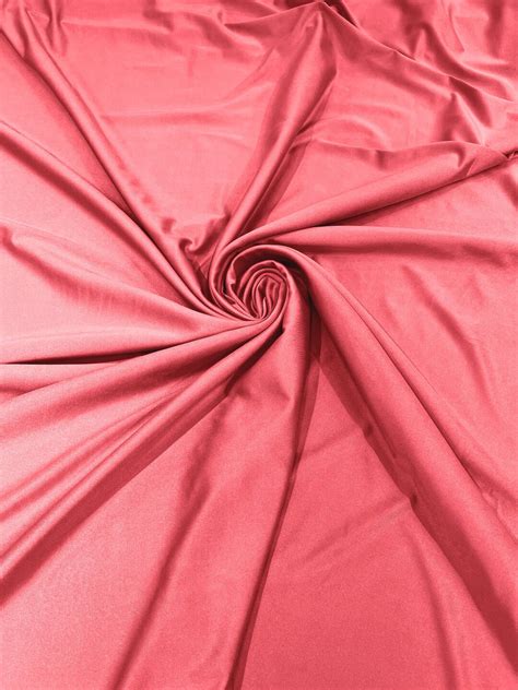 Neon Coral Shiny Milliskin Nylon Spandex Fabric Way Stretch Wide