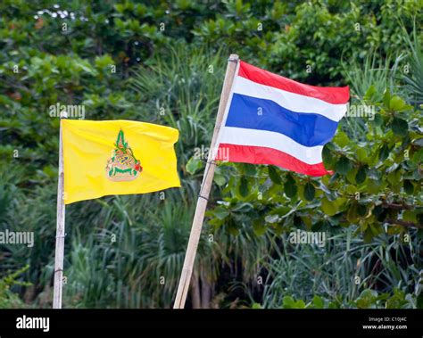 National flag and the royal flag of Thailand, Phuket Island, Southern ...