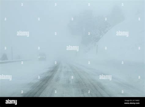 Mountain road in winter with snow Stock Photo - Alamy