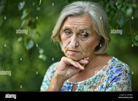 Nice sad old woman Stock Photo - Alamy