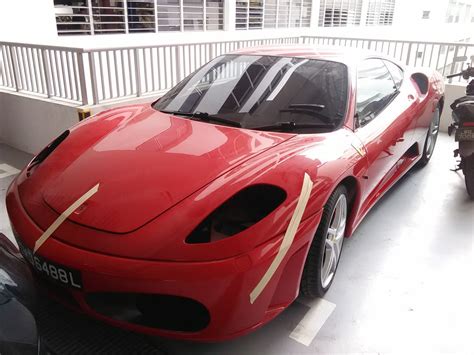 A Ferrari F430 I found with no side mirrors and missing headlights : r ...