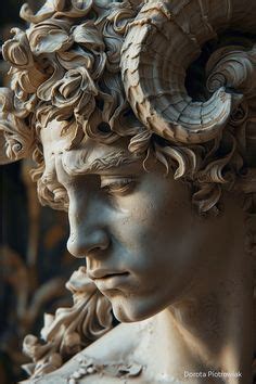 A Close Up Of A Statue Of A Man With Horns On His Head And Curly Hair