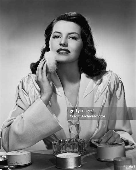 American Actress And Dancer Cyd Charisse Applying Her Make Up Circa